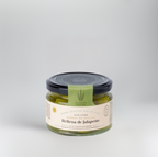 Jar of Relena de Jalapeno on a light gray background