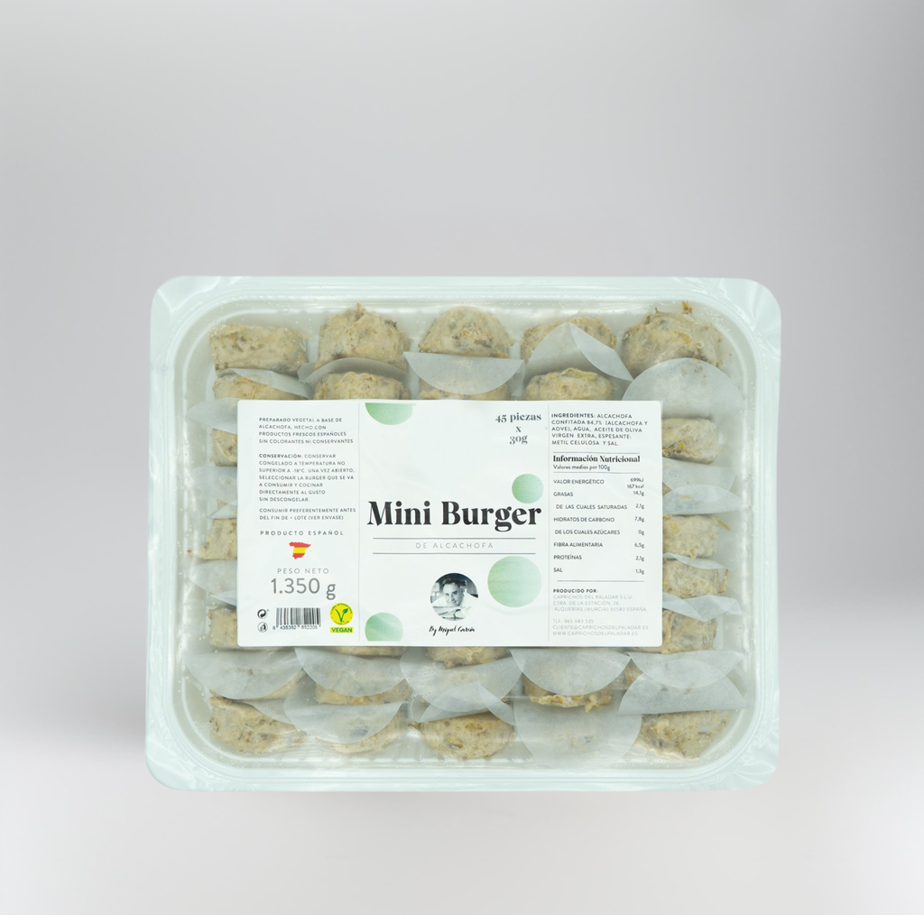 Packaged mini artichoke burgers with a label on a light gray background
