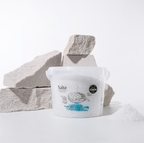 Container of Salte sea salt with salt blocks on a white background